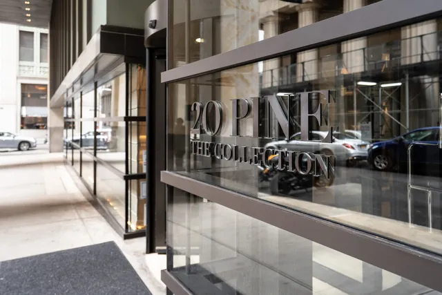 a view of a chairs and table in the balcony