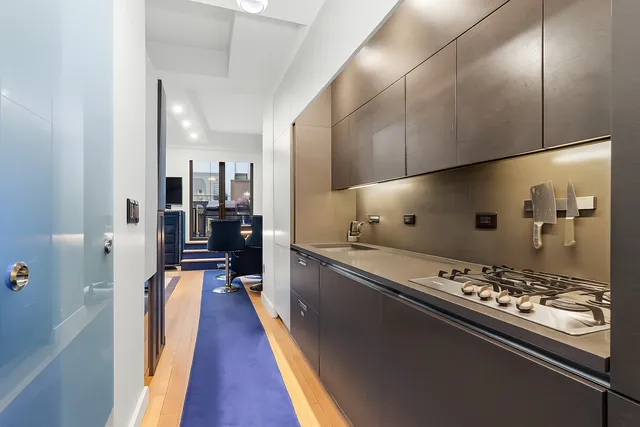 a black and white photo of a bench