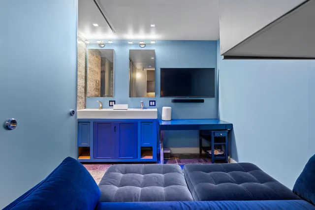 a workspace with furniture and window