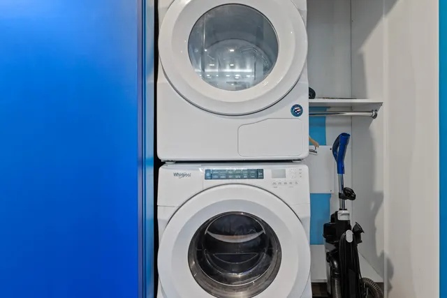 a kitchen with stainless steel appliances a sink stove and cabinets