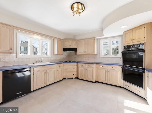 201 Grape Street Hammonton, NJ 08037 - Photo 13 of 34 a kitchen with granite countertop cabinets stainless steel appliances a sink and a window