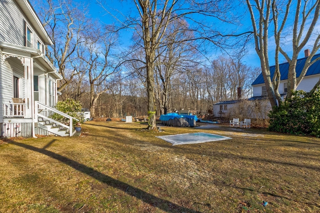 61 Church Street Merrimac, MA 01860 - Photo 21 of 32 a view of road with large trees