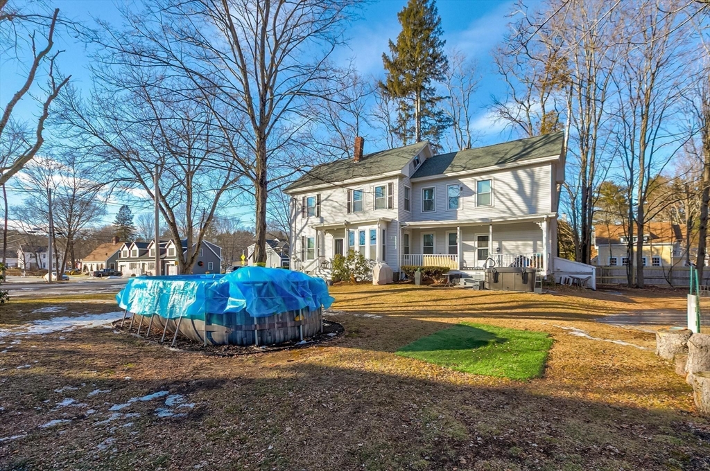 61 Church Street Merrimac, MA 01860 - Photo 22 of 32 a front view of a house with a yard