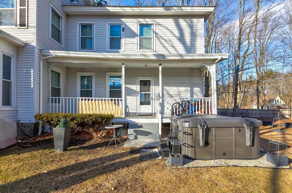 61 Church Street Merrimac, MA 01860 - Photo 23 of 32 a front view of a house with large windows