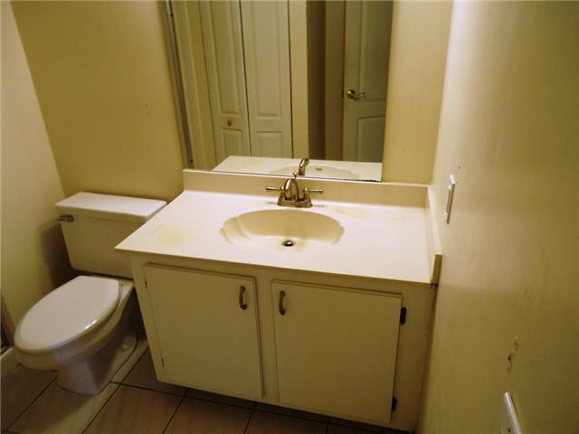 21218 Lago Circle, Unit B Boca Raton, FL 33433 - Photo 12 of 25 a bathroom with a sink and a toilet