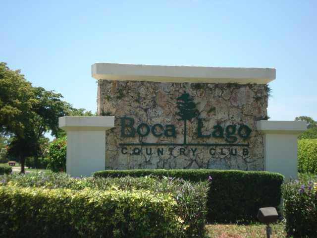 21218 Lago Circle, Unit B Boca Raton, FL 33433 - Photo 25 of 25 front view of a house with a wall