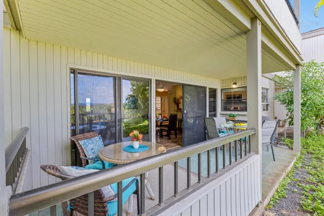 a view of a porch with chairs