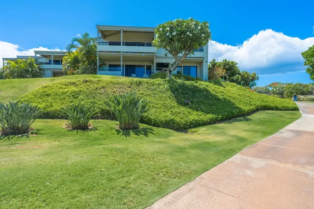 a house view with a garden space