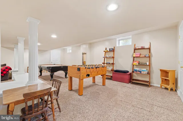 a view of an empty room with stairs