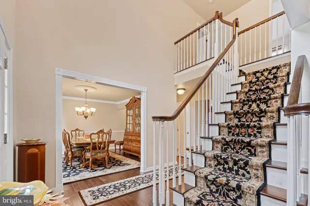 a view of entryway with wooden floor
