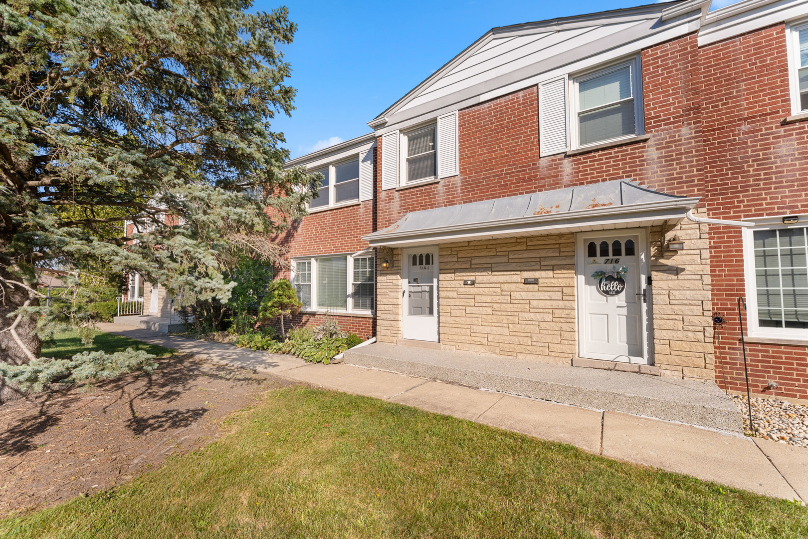 716 North Western Avenue Park Ridge, IL 60068 - Photo 1 of 26 a front view of a house with a yard