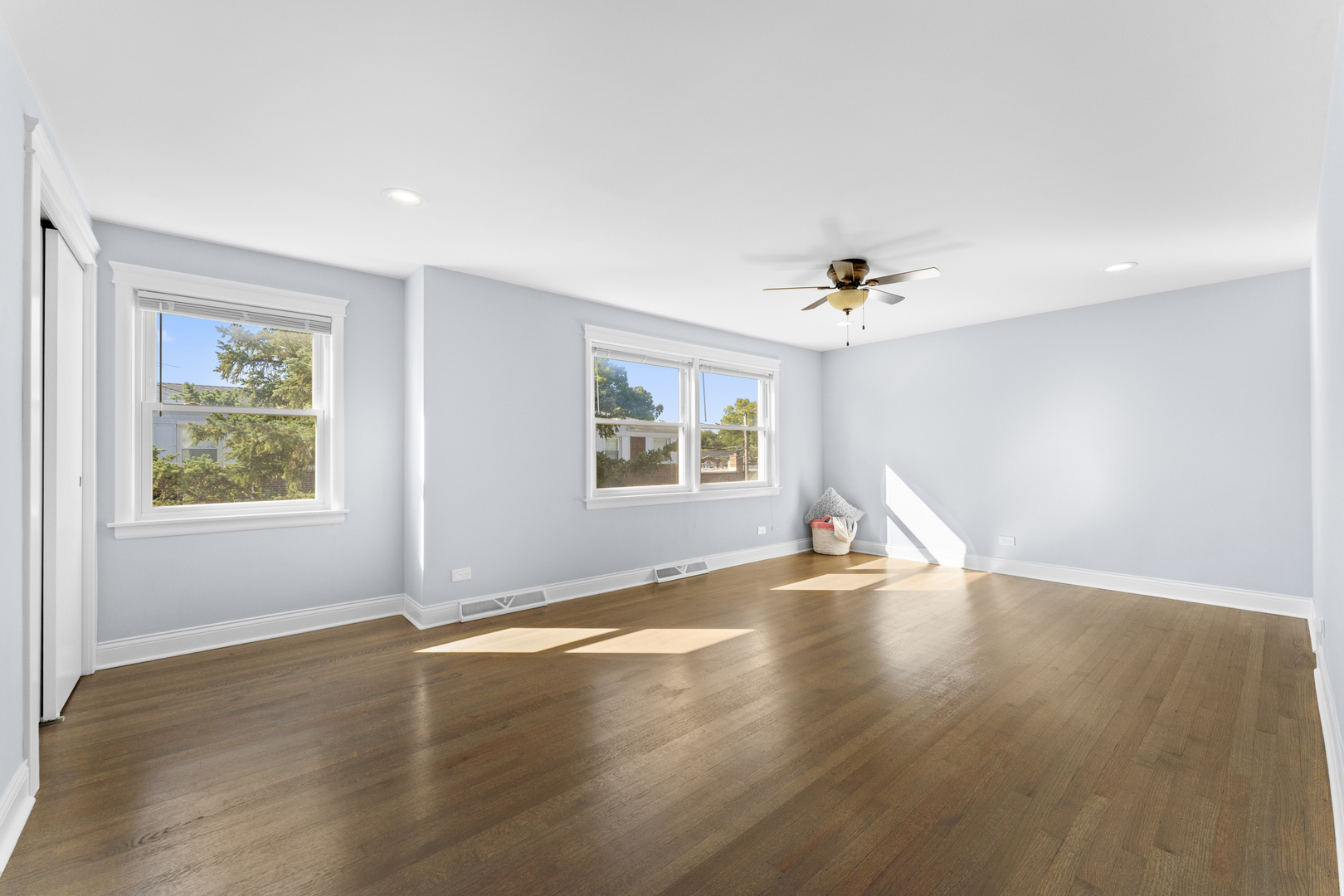 716 North Western Avenue Park Ridge, IL 60068 - Photo 12 of 26 an empty room with wooden floor and windows