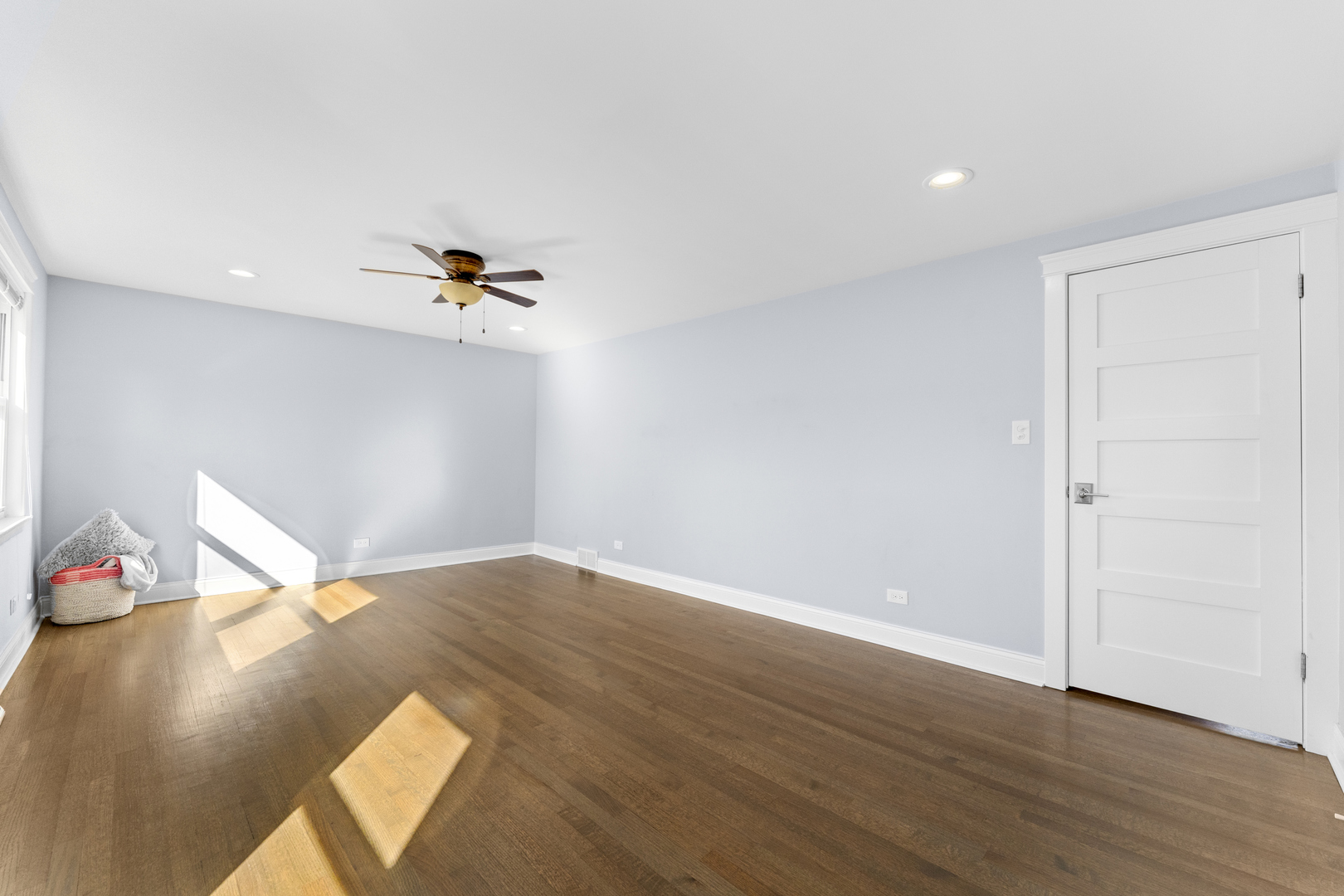 716 North Western Avenue Park Ridge, IL 60068 - Photo 13 of 26 a view of an empty room with wooden floor and a window