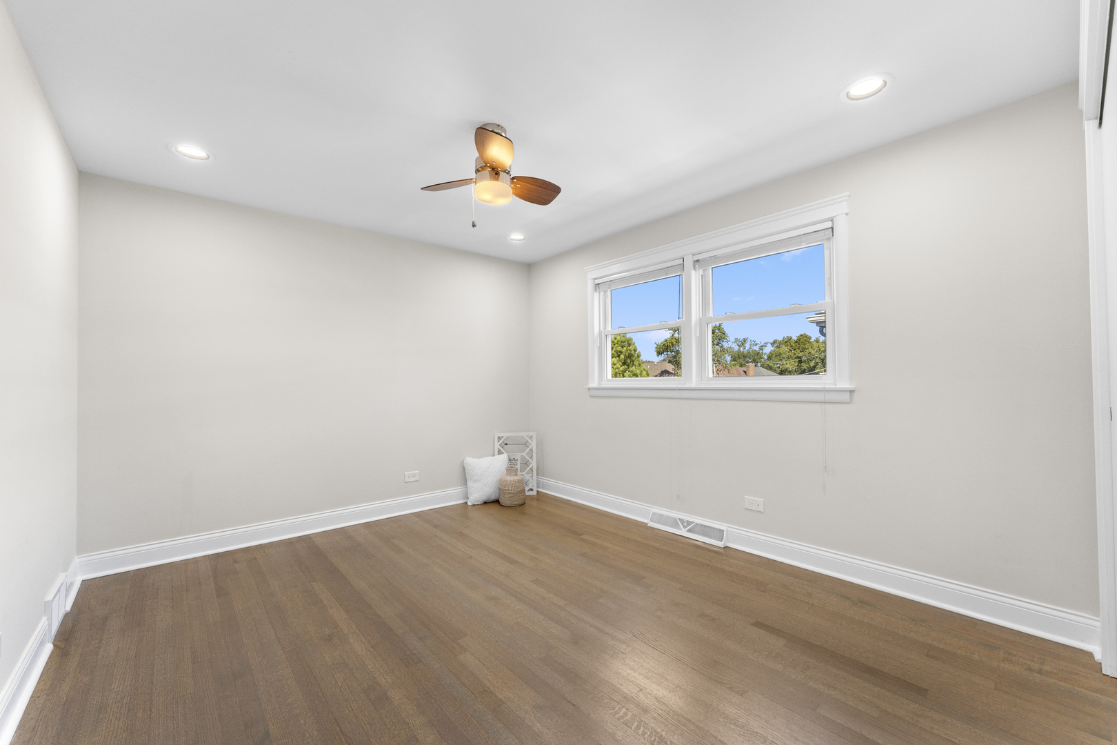 716 North Western Avenue Park Ridge, IL 60068 - Photo 16 of 26 an empty room with wooden floor and window