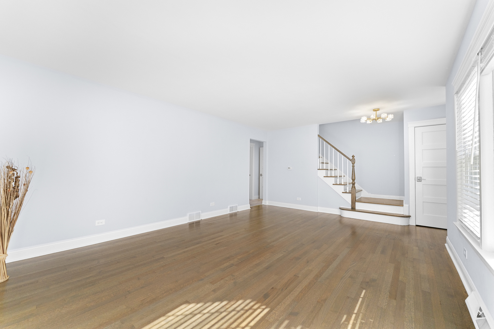 716 North Western Avenue Park Ridge, IL 60068 - Photo 3 of 26 an empty room with wooden floor and windows