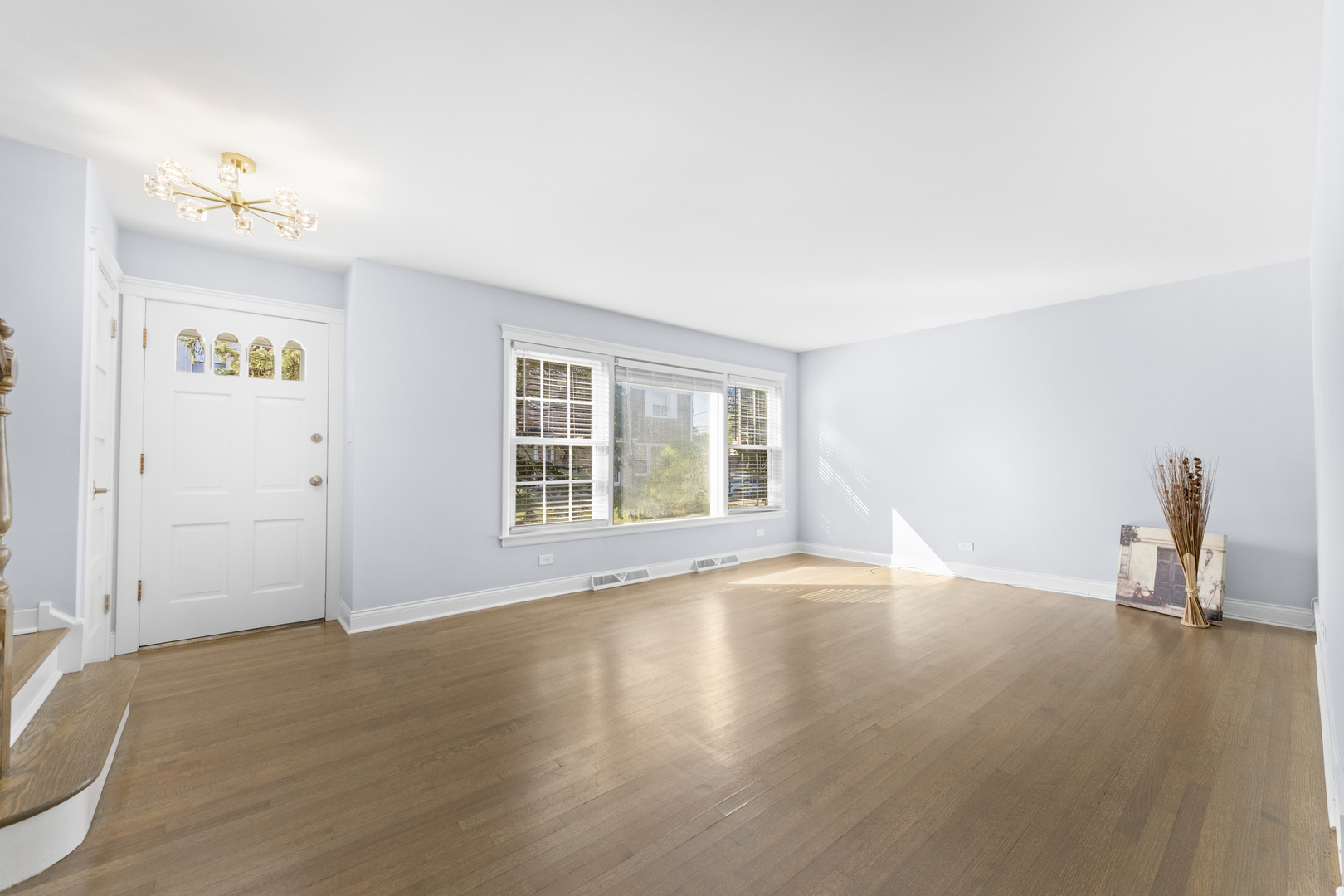 716 North Western Avenue Park Ridge, IL 60068 - Photo 5 of 26 a view of an empty room with wooden floor and a window