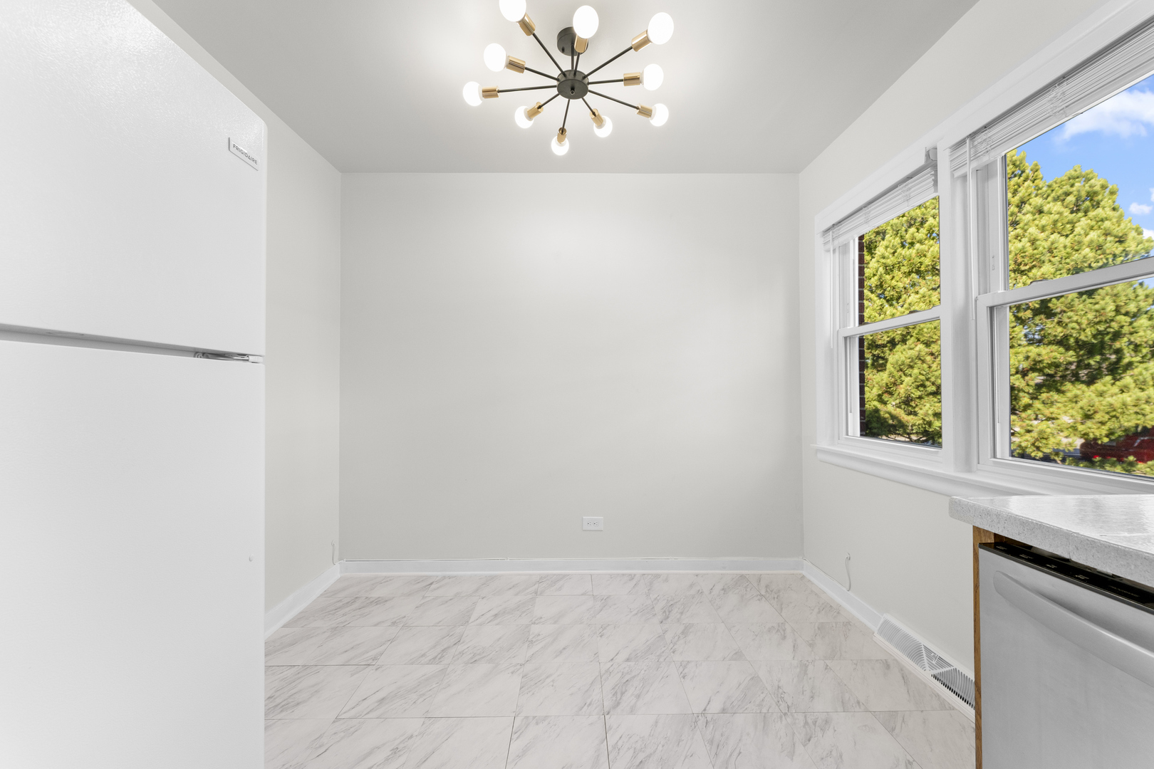 716 North Western Avenue Park Ridge, IL 60068 - Photo 9 of 26 an empty room with windows and fan