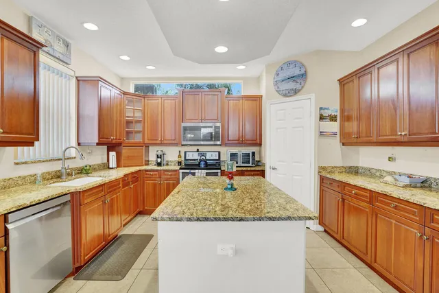 $900,000 | 7541 Downwinds Lane, Lake Worth, FL 33467