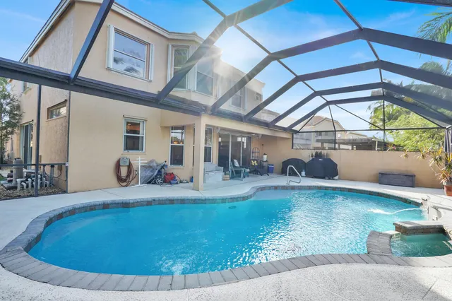 $900,000 | 7541 Downwinds Lane, Lake Worth, FL 33467