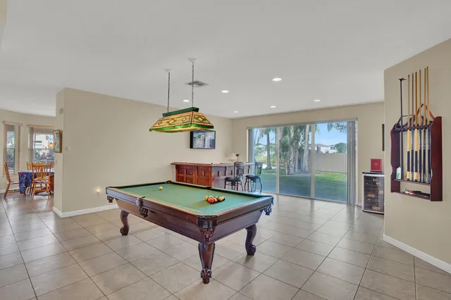 $900,000 | 7541 Downwinds Lane, Lake Worth, FL 33467