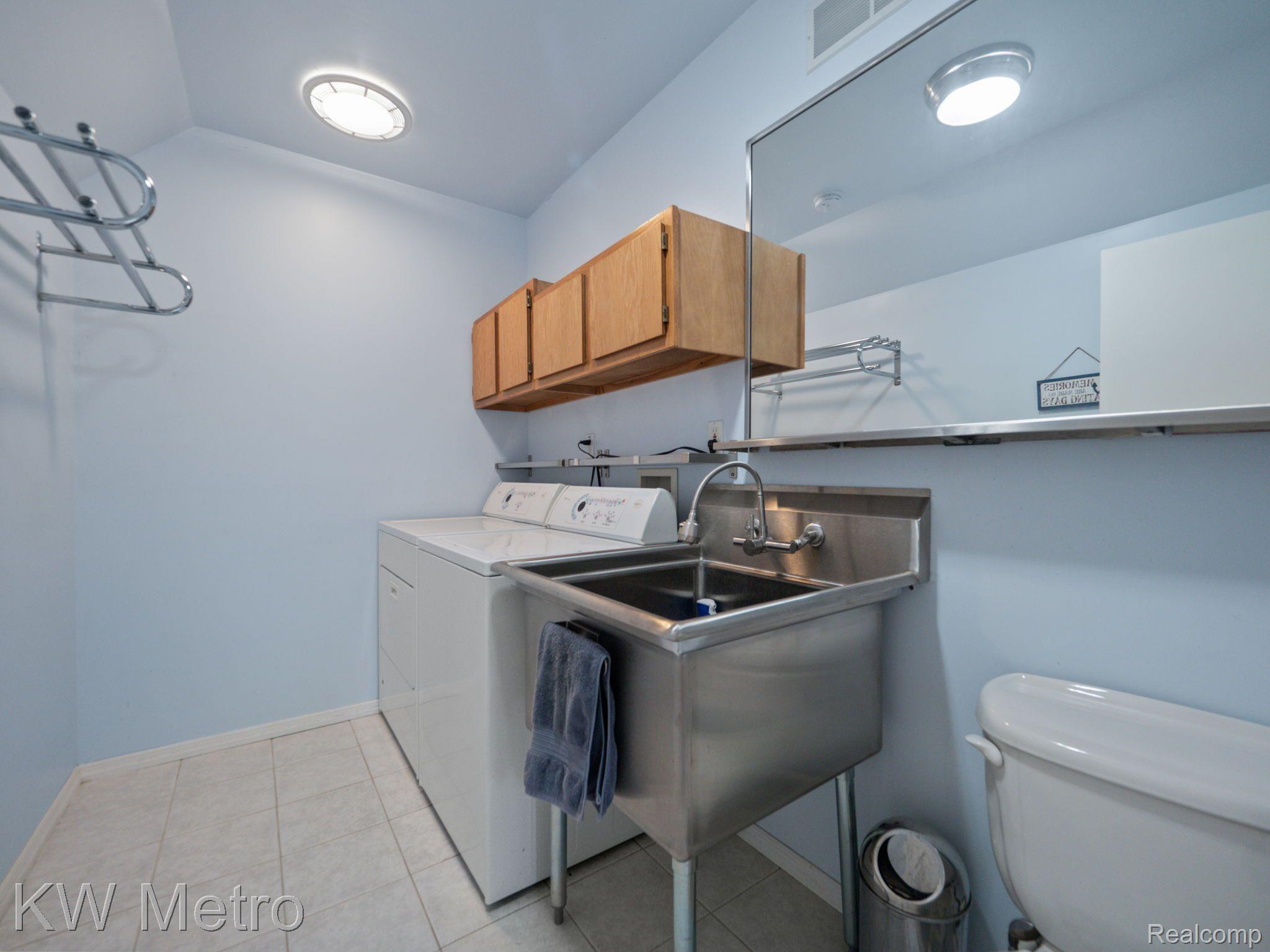 3205 Stanton Road Lake Orion, MI 48362 - Photo 38 of 60 First floor laundry and half bath
