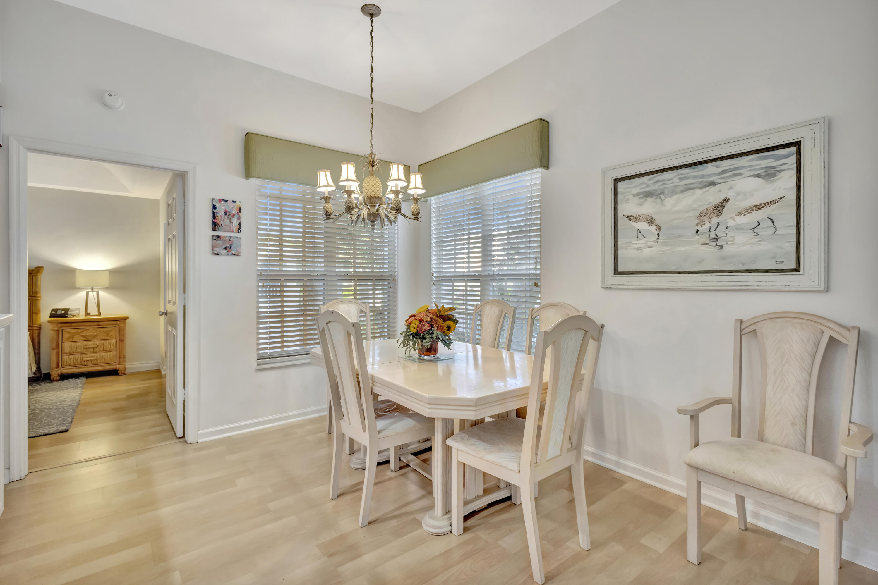 411 Northeast Plantation Road, Unit 522 Stuart, FL 34996 - Photo 13 of 52 a dining room with furniture and window