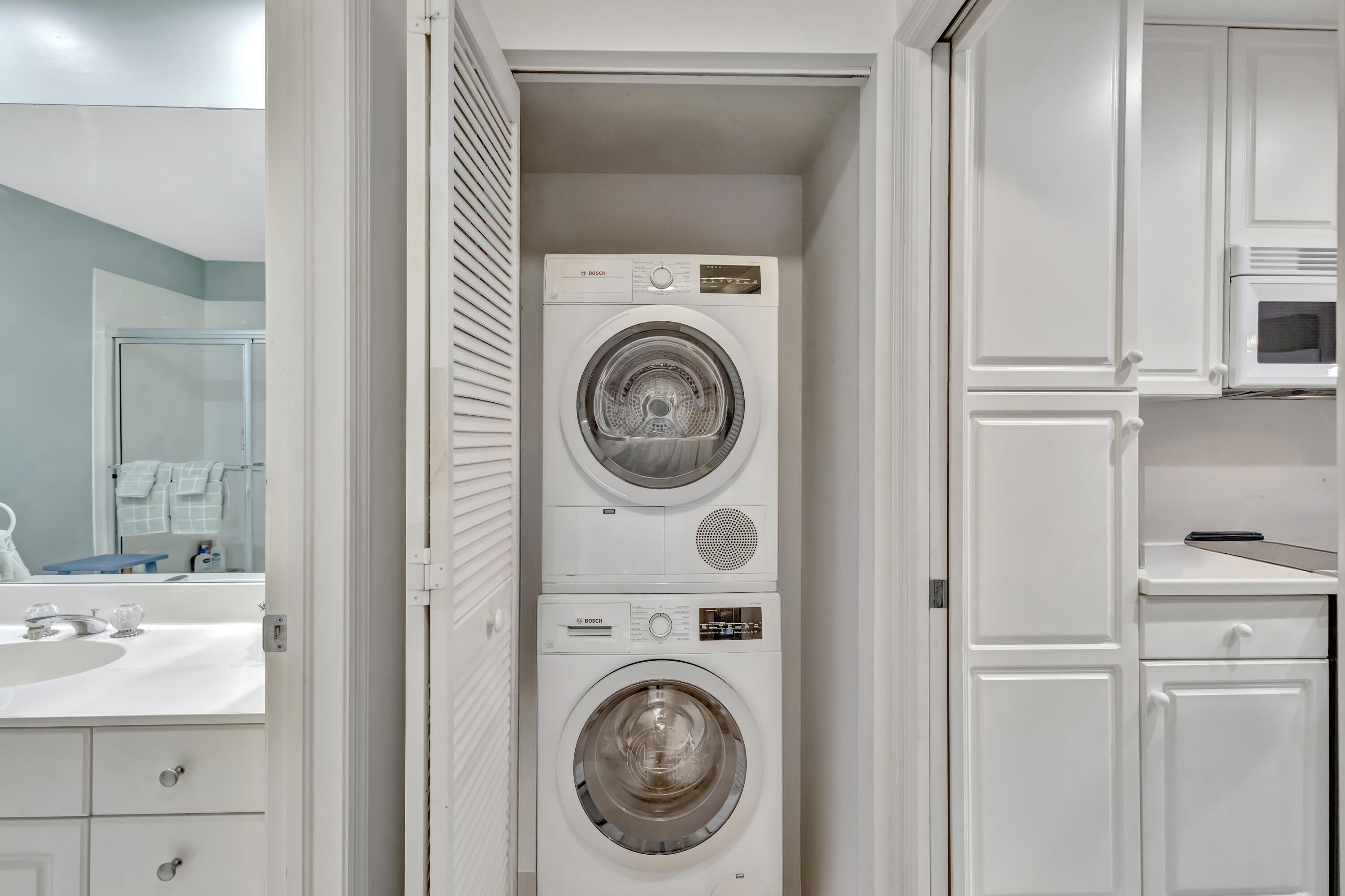 411 Northeast Plantation Road, Unit 522 Stuart, FL 34996 - Photo 24 of 52 a utility room with dryer and washer