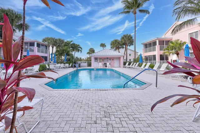 a view of a swimming pool with a patio
