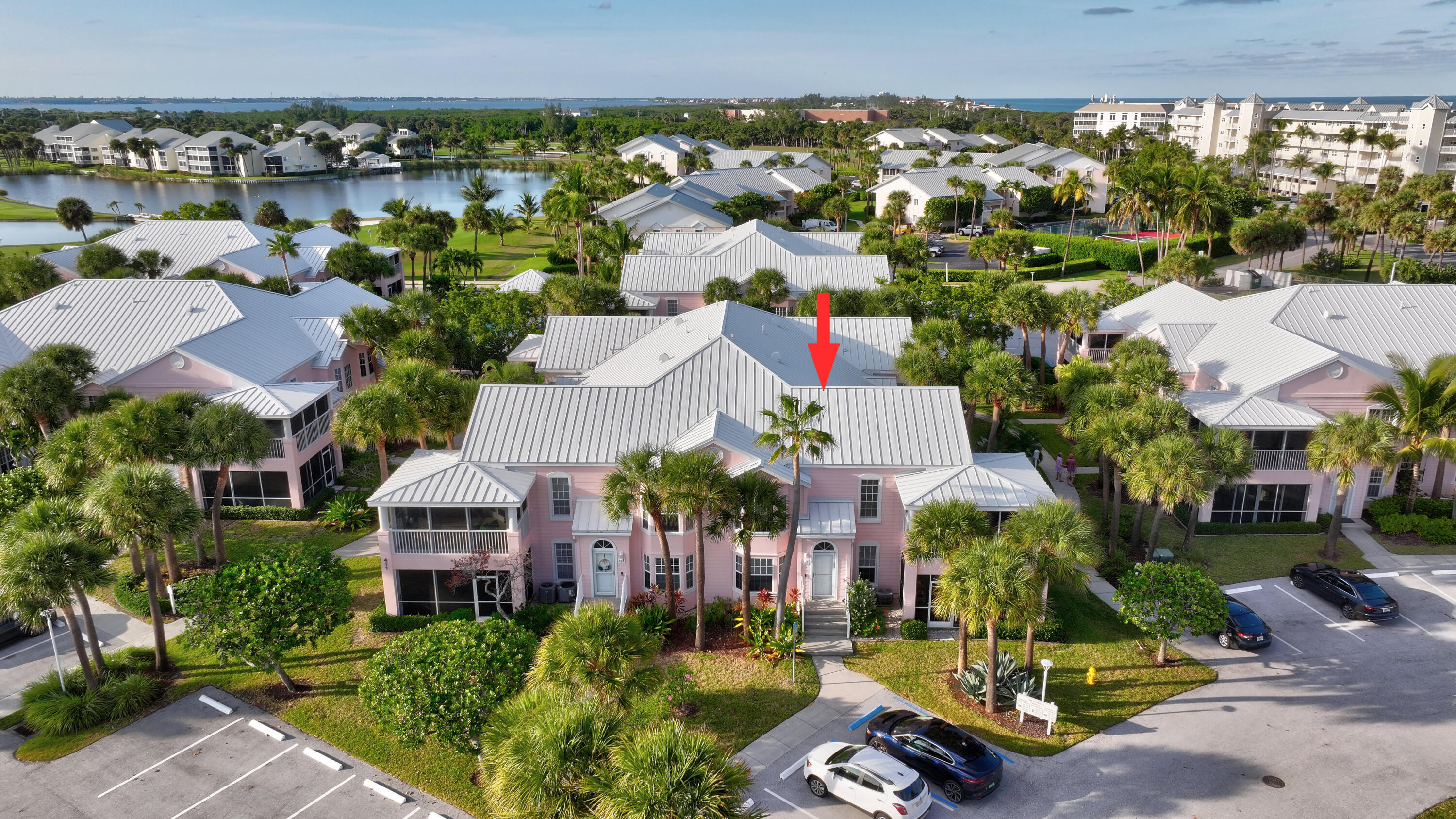 411 Northeast Plantation Road, Unit 522 Stuart, FL 34996 - Photo 35 of 52 an aerial view of multiple houses with a yard