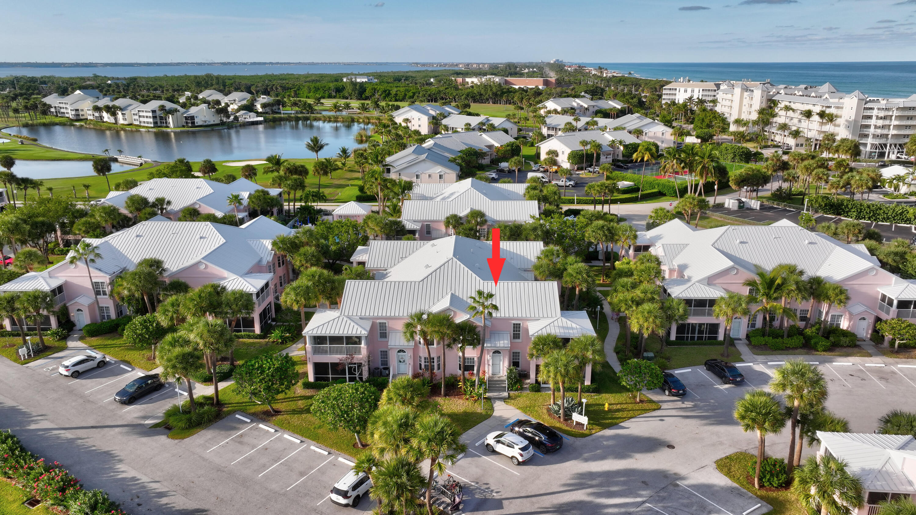 411 Northeast Plantation Road, Unit 522 Stuart, FL 34996 - Photo 36 of 52 an aerial view of residential houses with outdoor space and swimming pool