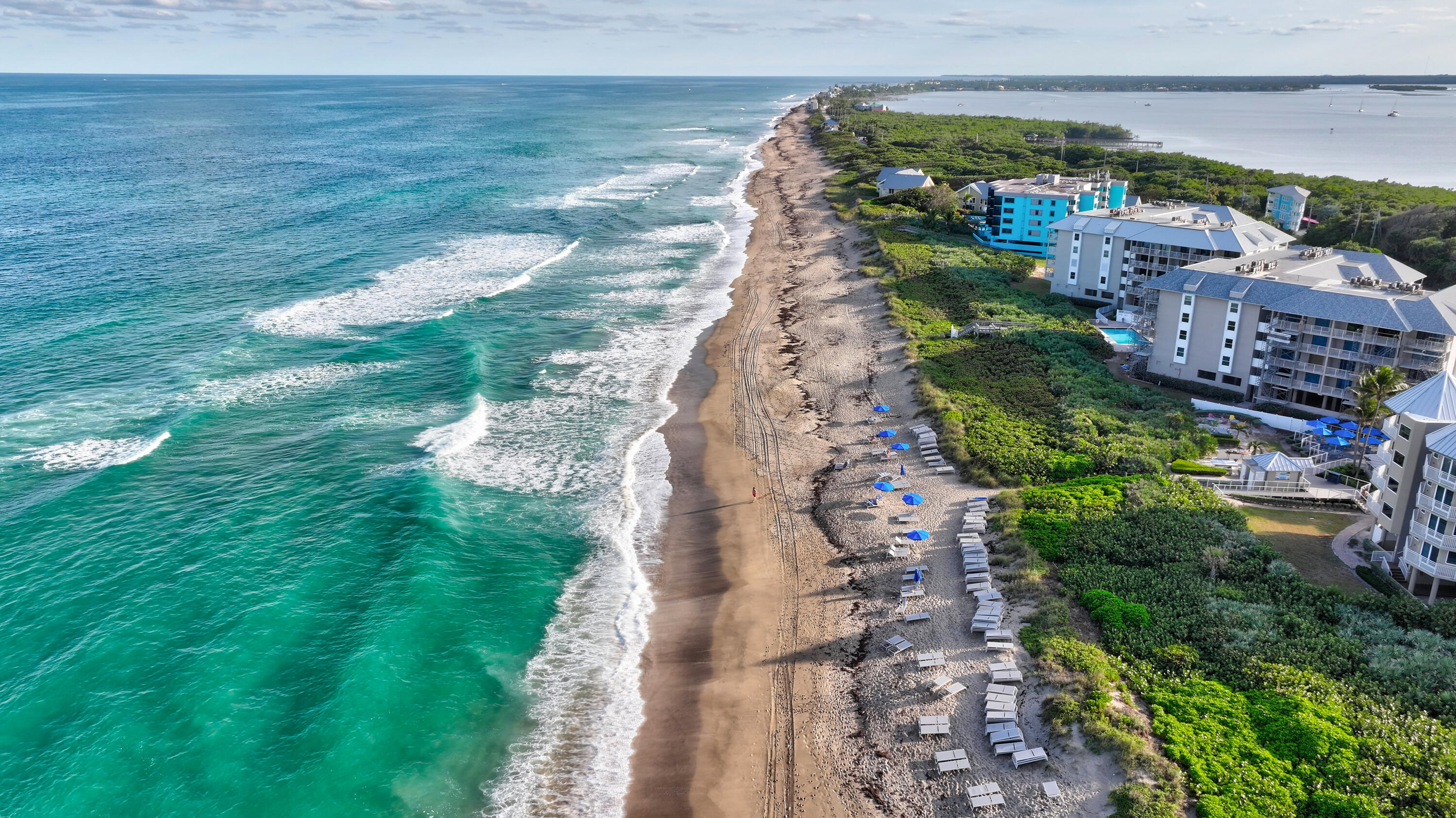 411 Northeast Plantation Road, Unit 522 Stuart, FL 34996 - Photo 48 of 52 a view of a yard with an ocean view