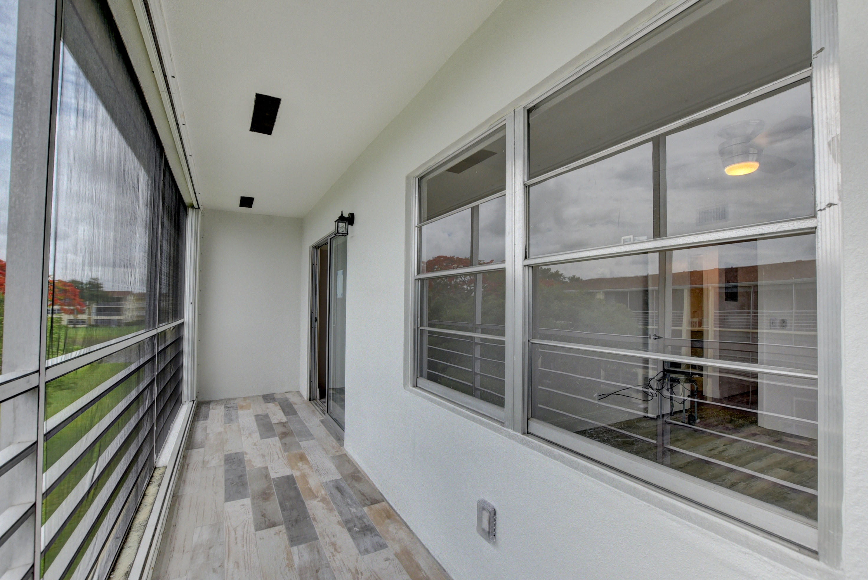 113 Dorset C Boca Raton, FL 33434 - Photo 22 of 49 SCREENED PORCH