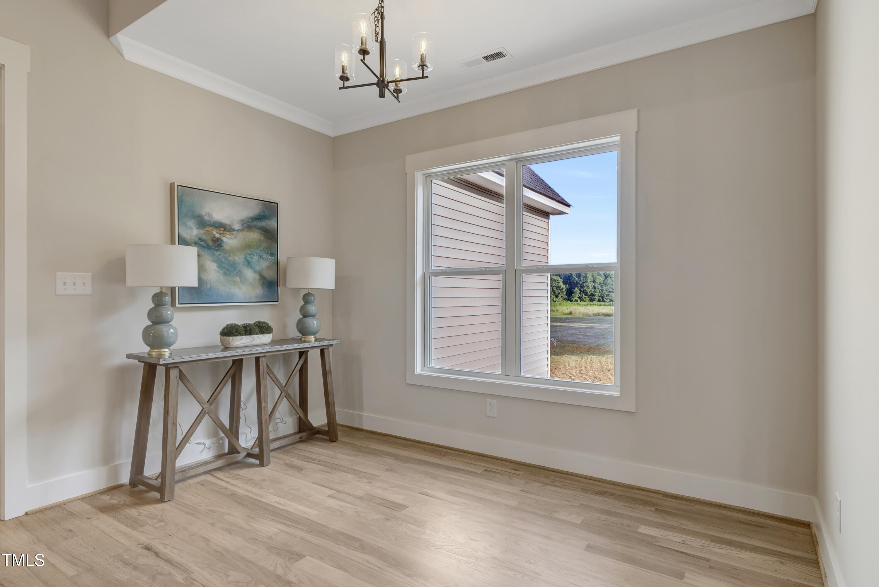 0 Radio Tower Road Wilson, NC 27893 - Photo 11 of 48 a view of a room with a window and wooden floor