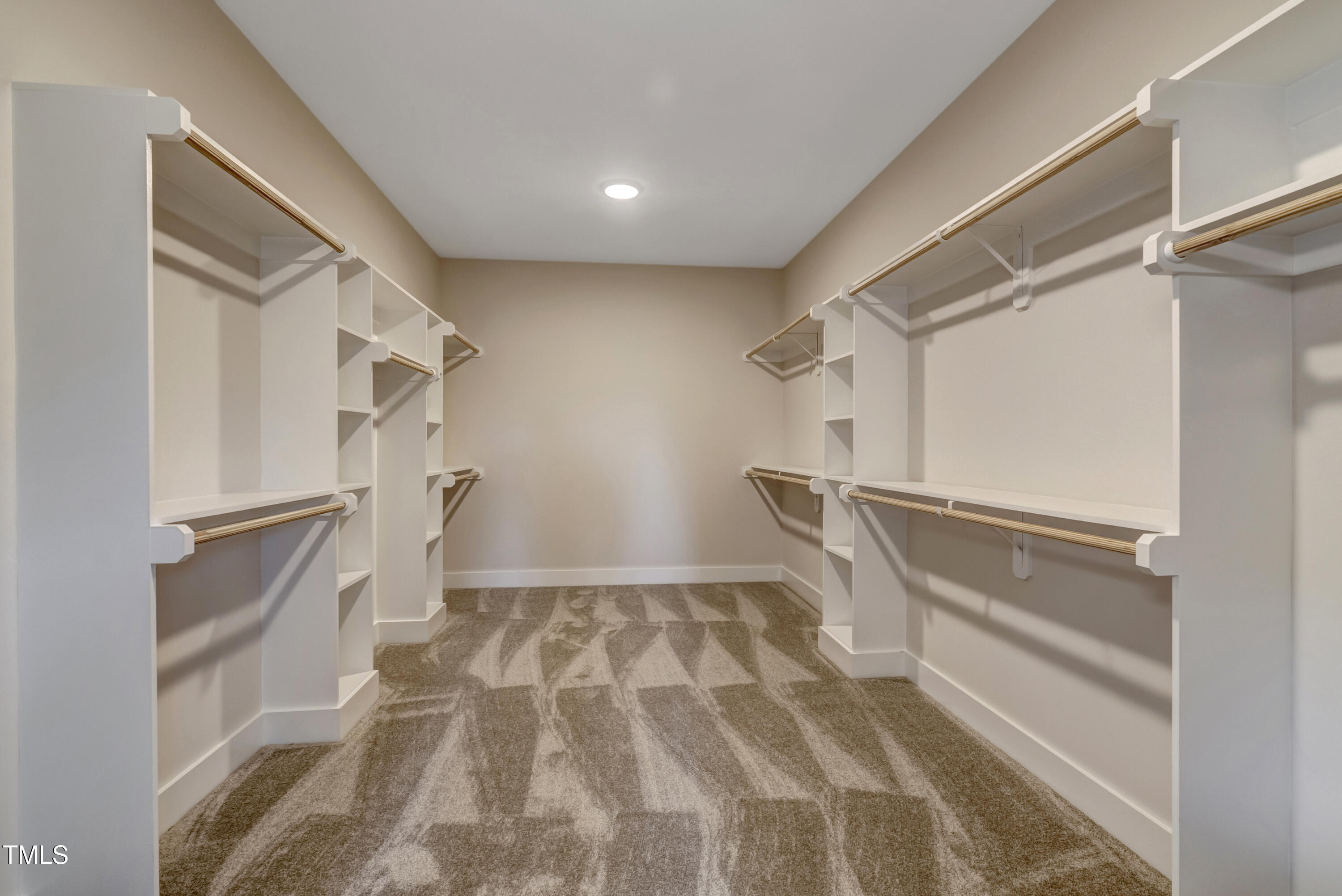 0 Radio Tower Road Wilson, NC 27893 - Photo 19 of 48 a view of walk in closet with empty racks