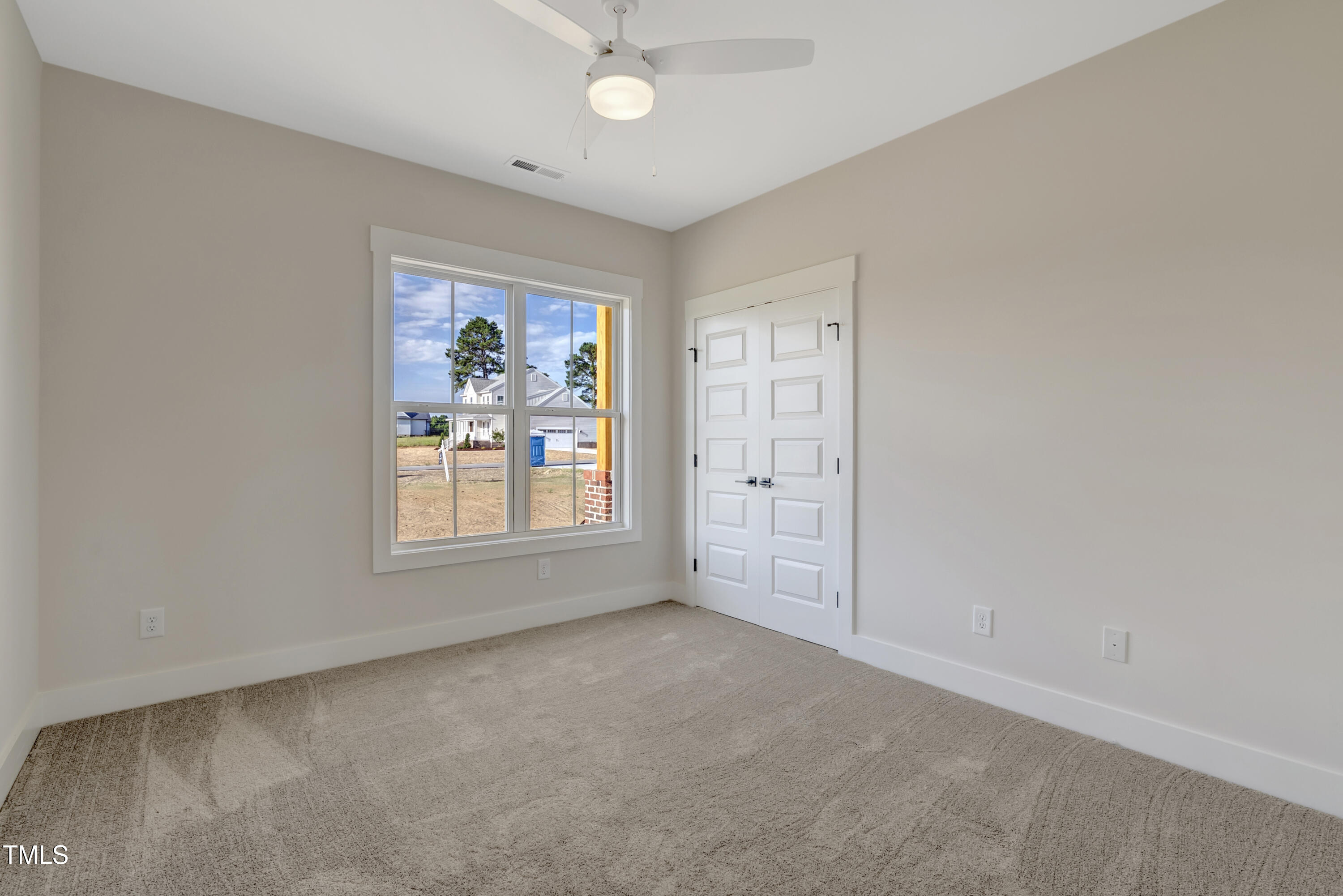 0 Radio Tower Road Wilson, NC 27893 - Photo 21 of 48 an empty room with windows and closet