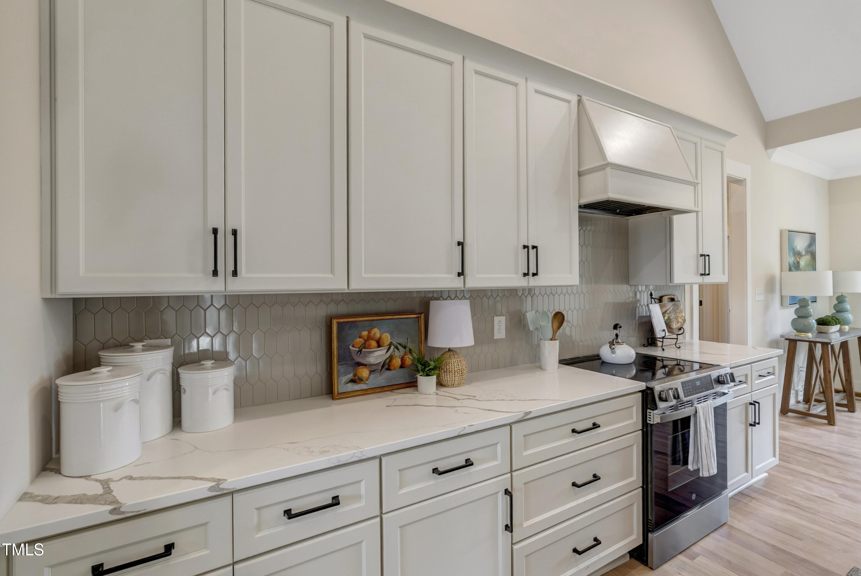 0 Radio Tower Road Wilson, NC 27893 - Photo 10 of 48 a kitchen with white cabinets and sink