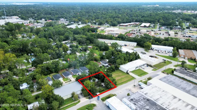 a swimming pool with outdoor seating and yard