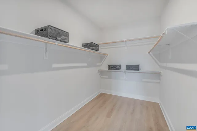 a view of a room with racks on the wall