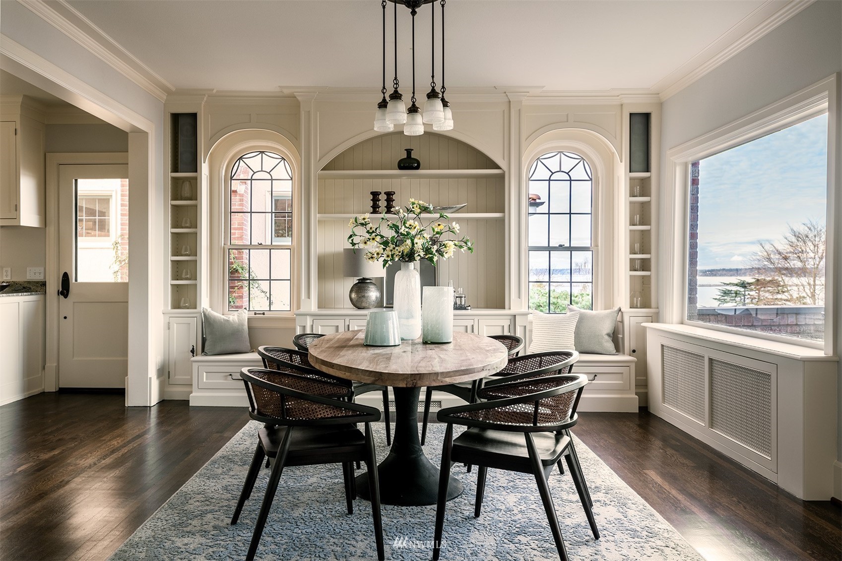 3328 Cascadia Avenue South Seattle, WA 98144 - Photo 11 of 40 a view of a a dining room with furniture window and wooden floor