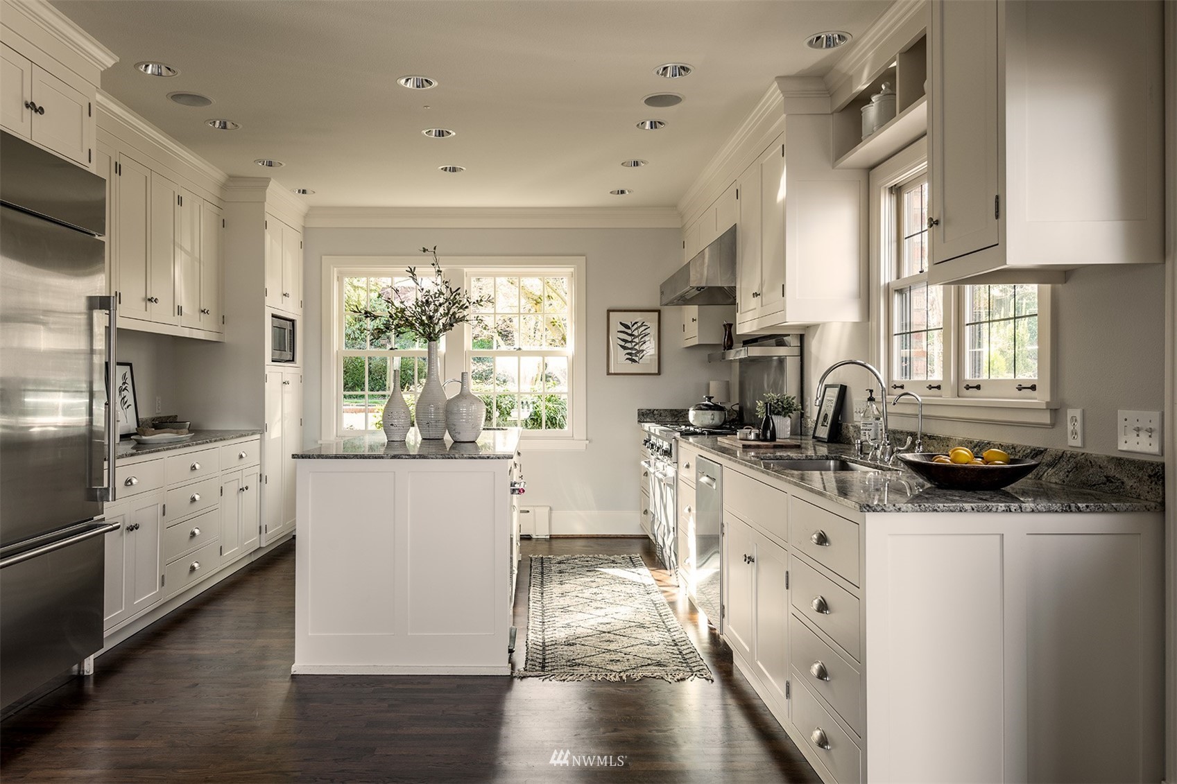 3328 Cascadia Avenue South Seattle, WA 98144 - Photo 14 of 40 a kitchen with granite countertop a sink stove and cabinets