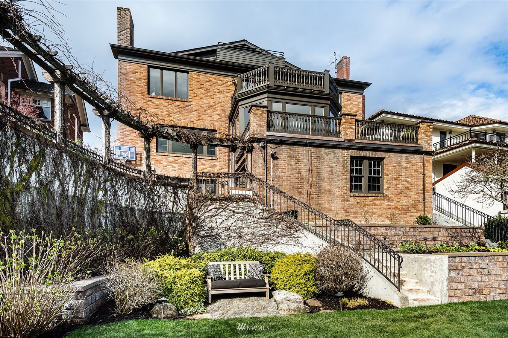3328 Cascadia Avenue South Seattle, WA 98144 - Photo 39 of 40 a view of a house with a yard and plants