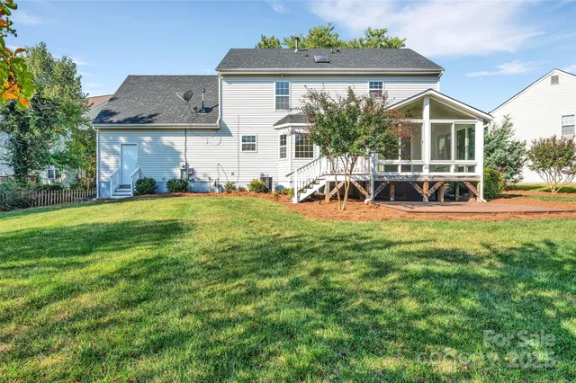 front view of a house with a big yard