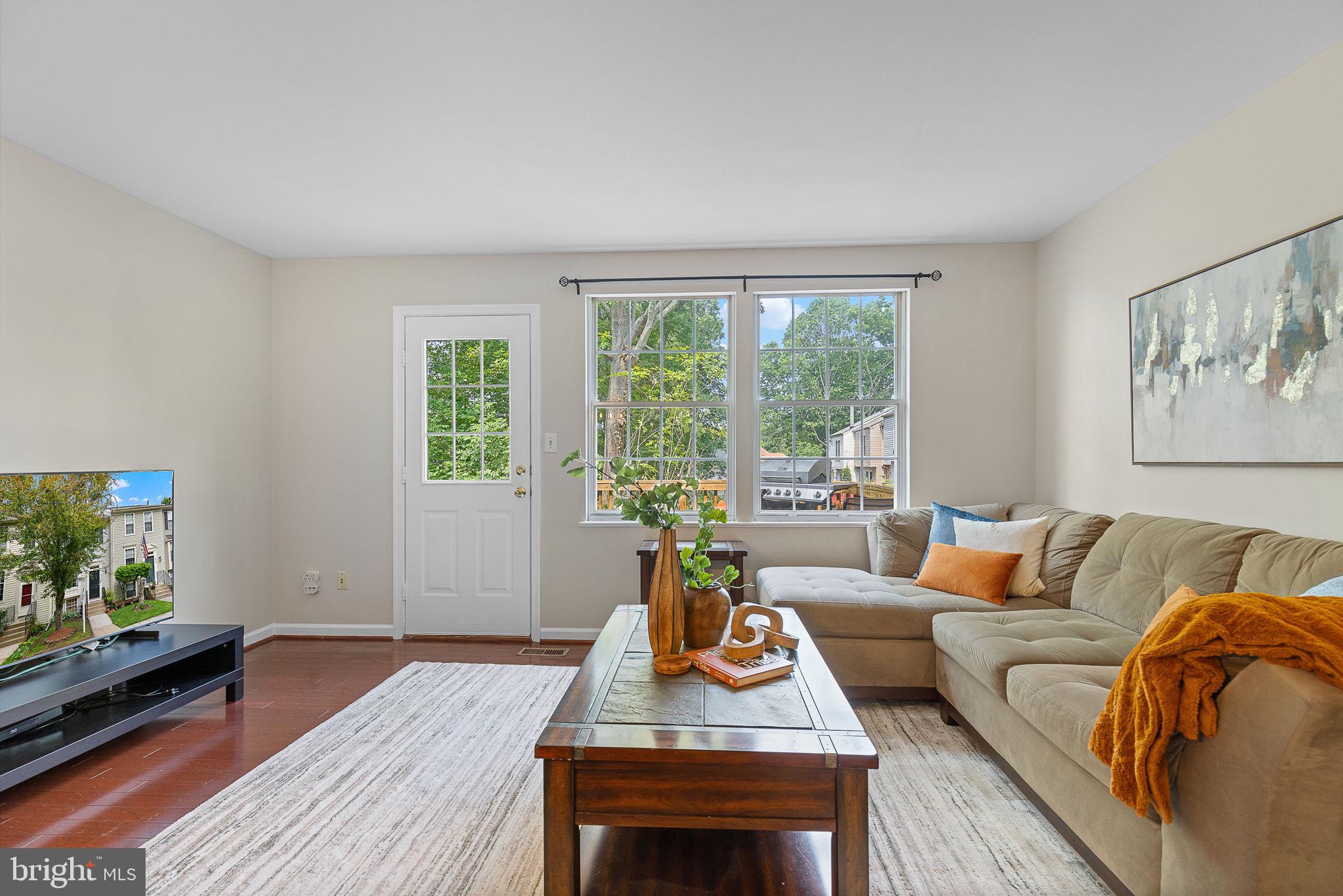 6582 Skylemar Trail Centreville, VA 20121 - Photo 21 of 46 a living room with furniture and a flat screen tv