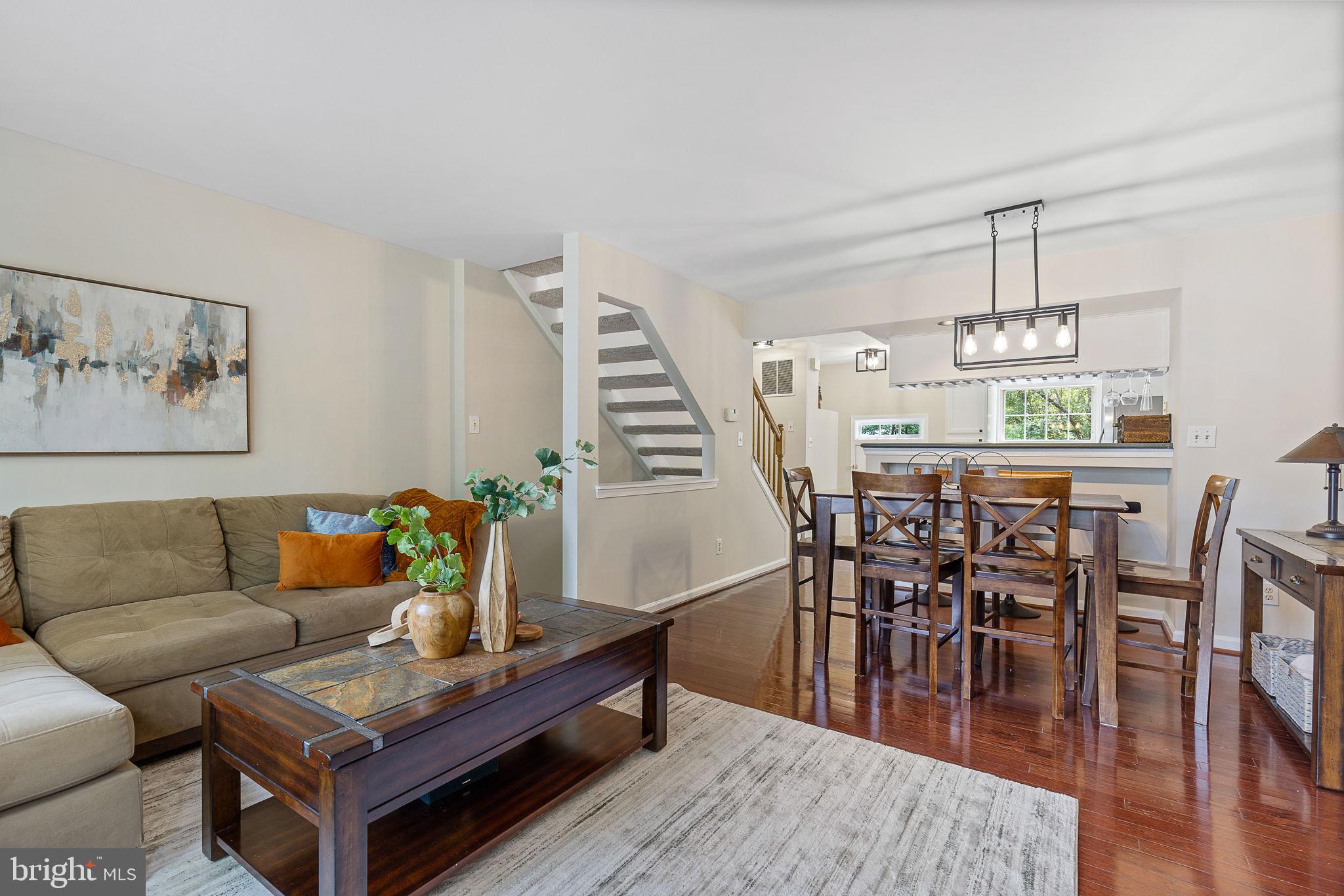 6582 Skylemar Trail Centreville, VA 20121 - Photo 24 of 46 a living room with furniture and wooden floor