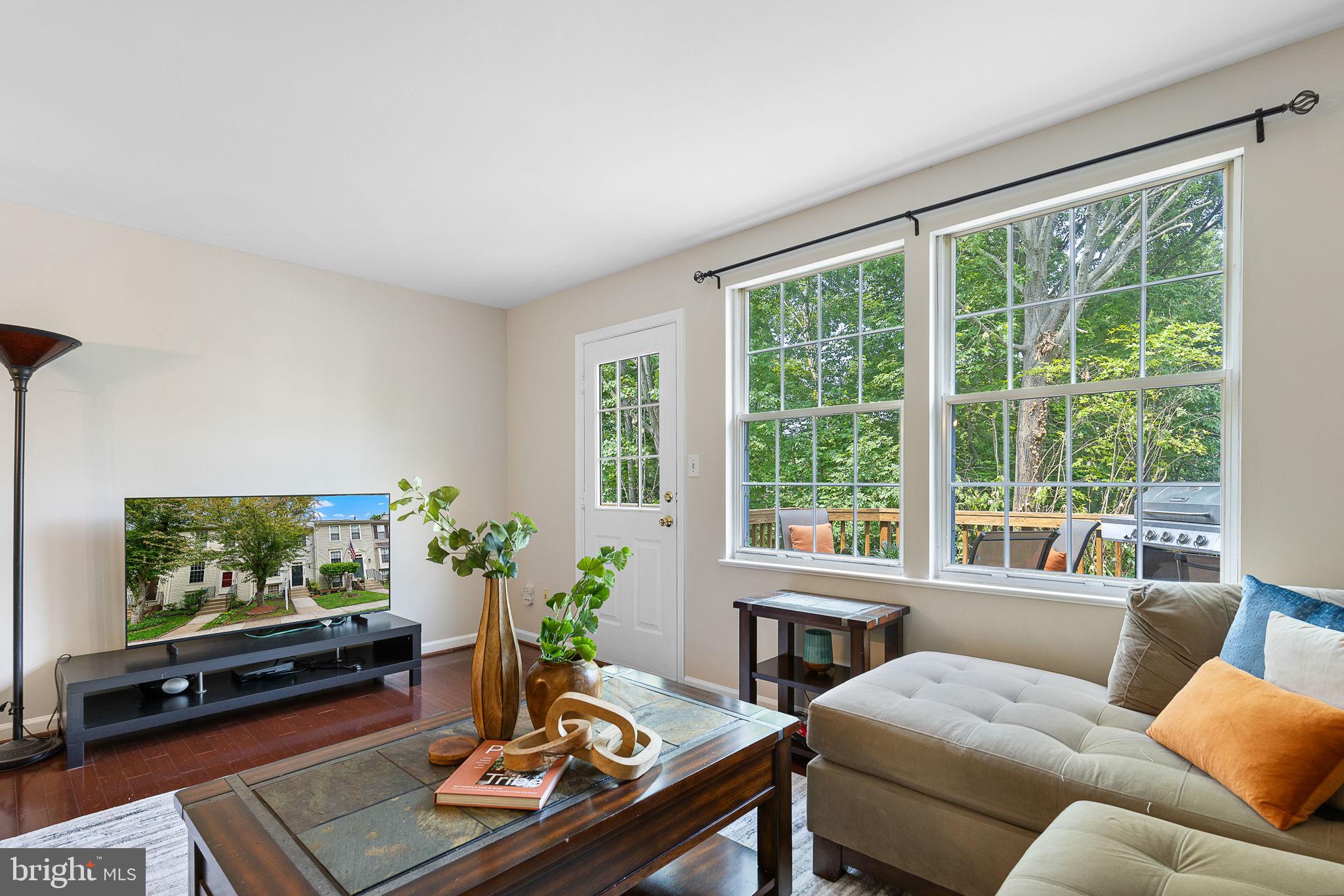 6582 Skylemar Trail Centreville, VA 20121 - Photo 25 of 46 a living room with furniture and a flat screen tv