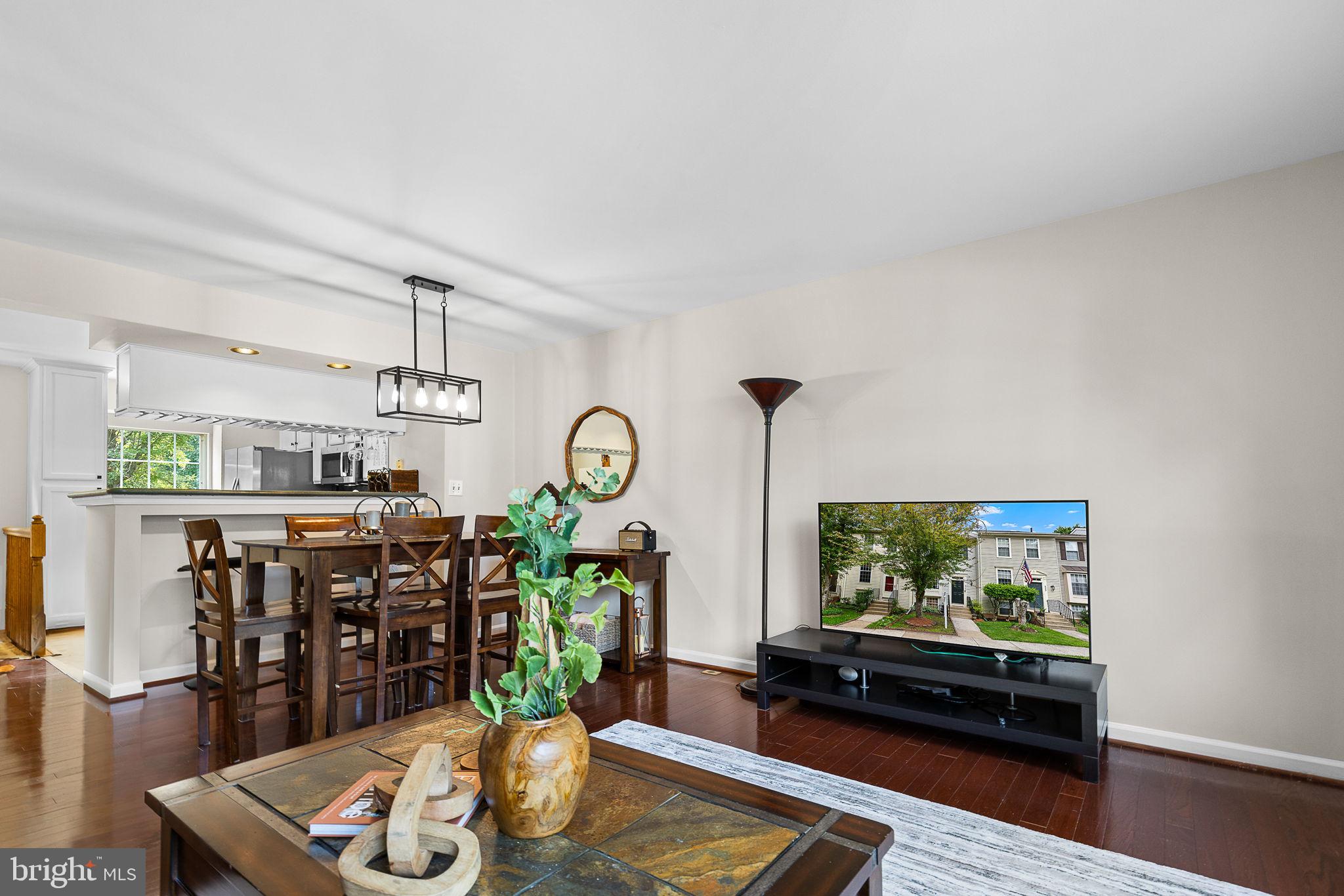 6582 Skylemar Trail Centreville, VA 20121 - Photo 26 of 46 a living room with furniture and wooden floor