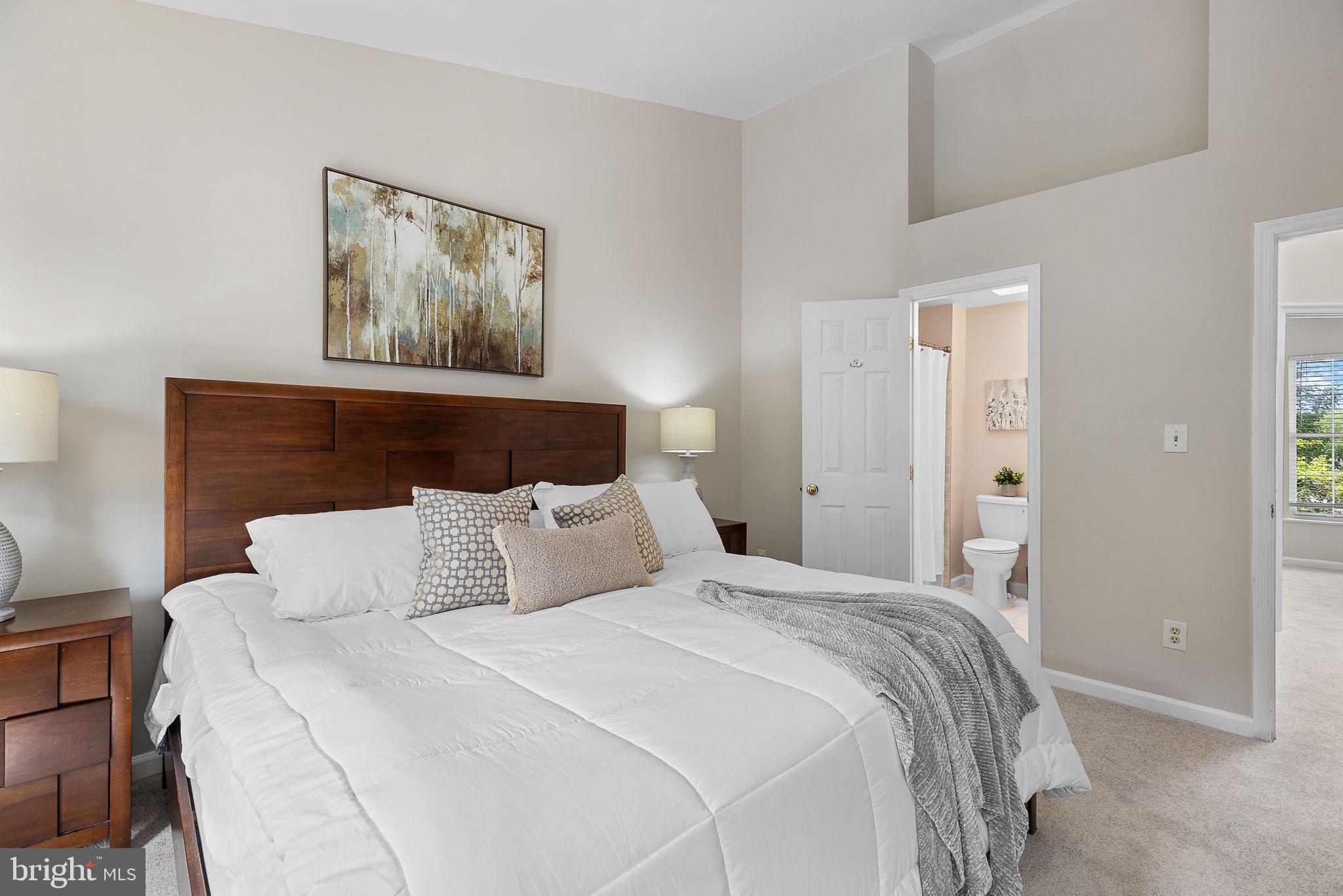 6582 Skylemar Trail Centreville, VA 20121 - Photo 28 of 46 a bedroom with a bed and painting on the wall