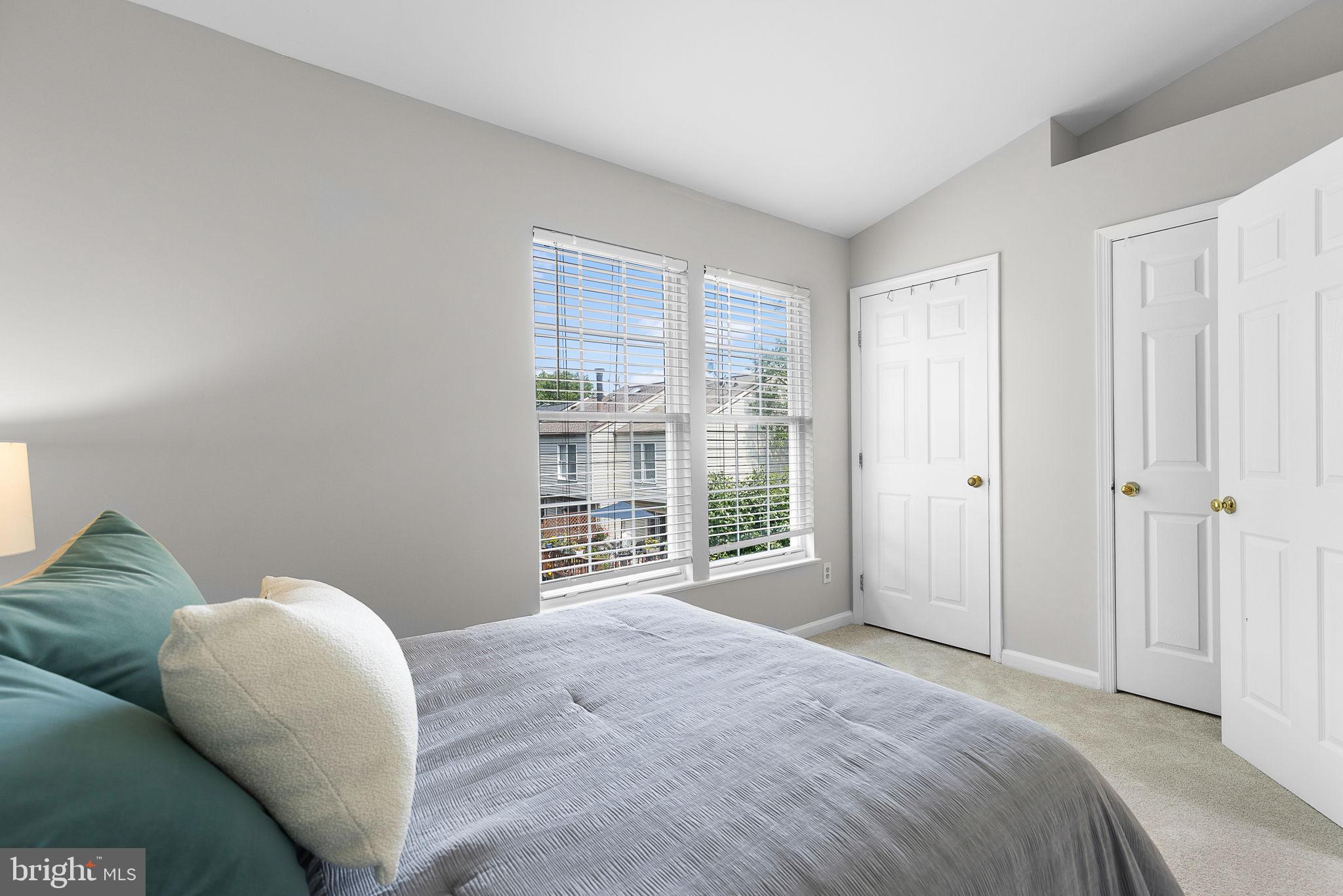6582 Skylemar Trail Centreville, VA 20121 - Photo 32 of 46 a view of a bedroom with a bed and a window