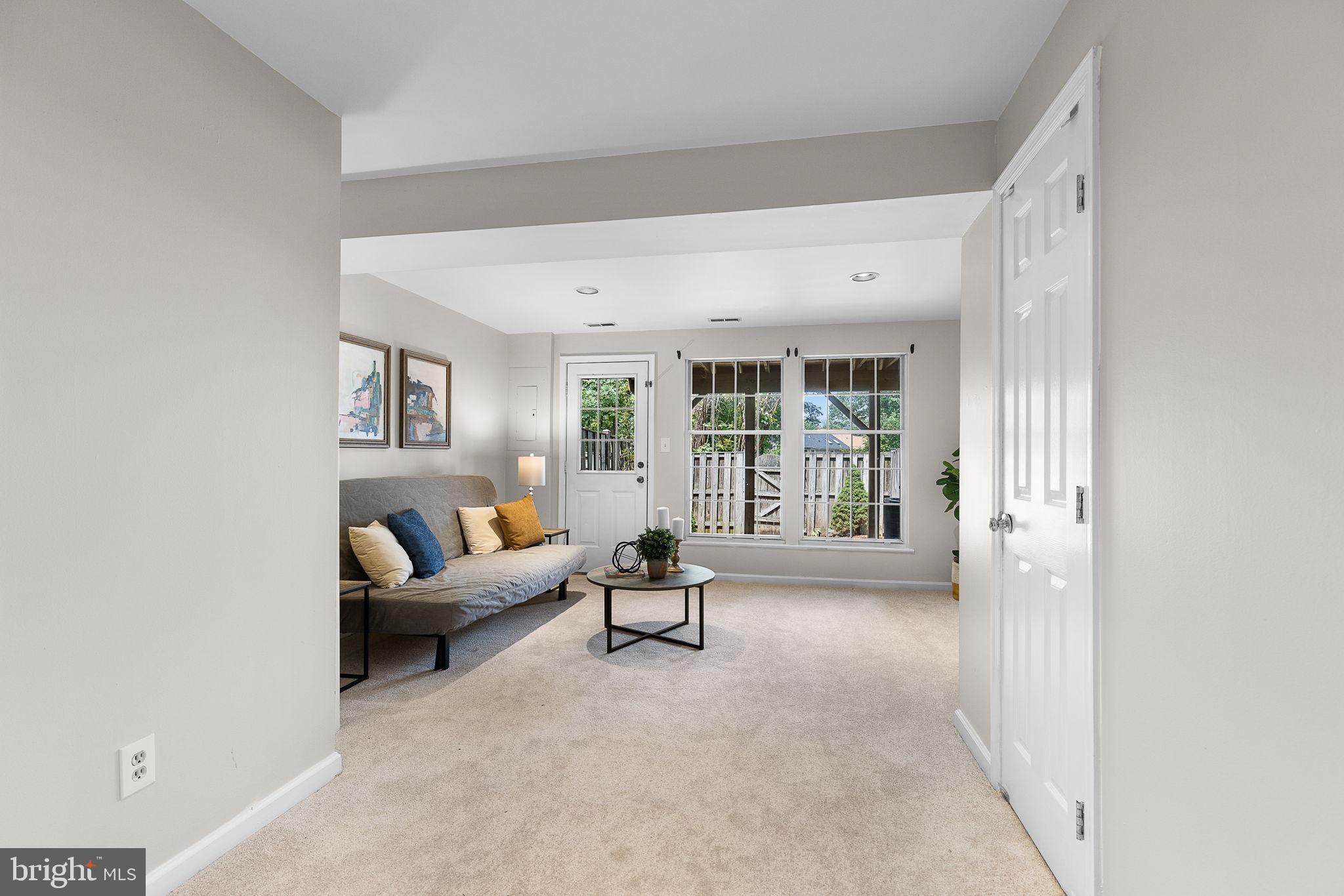 6582 Skylemar Trail Centreville, VA 20121 - Photo 35 of 46 a living room with furniture and a window
