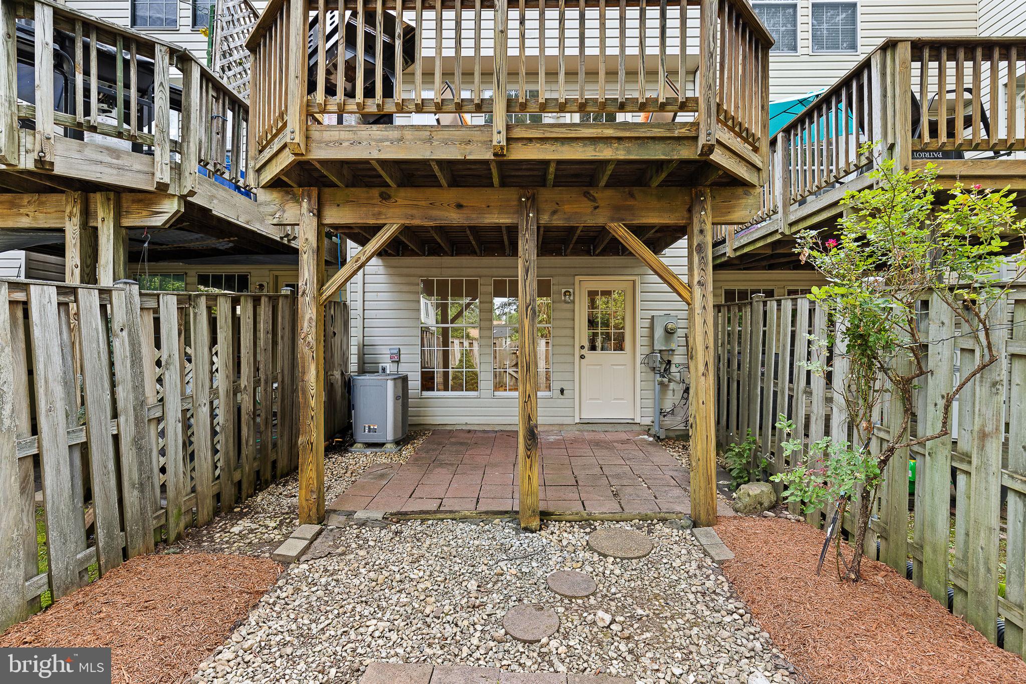 6582 Skylemar Trail Centreville, VA 20121 - Photo 43 of 46 a view of a porch with a table and chairs